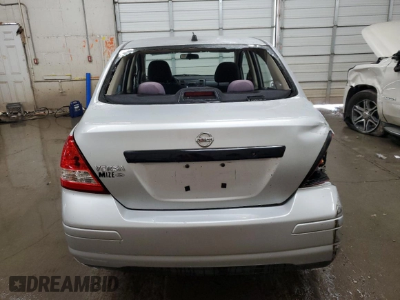 2009 Nissan Versa 1.6 with VIN 3N1CC11E49L422408, listed as a Copart auction lot 55093745 with 169,189 mi miles and Salvage title. Bid and sale history available at DreamBid. Image 6.