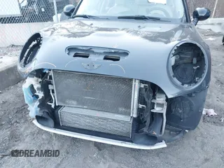 2016 MINI Cooper Hardtop 4 Door S with VIN WMWXU3C56G2B63682, listed as a IAAI auction lot 41244676 with 110,902 mi miles. Bid and sale history available at carsss.com. Image 6.