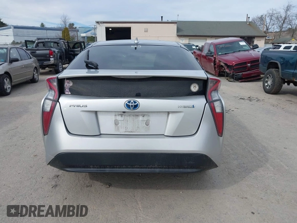 2016 Toyota Prius Two with VIN JTDKBRFUXG3023523, listed as a IAAI auction lot 41757143 with 124,144 mi miles. Bid and sale history available at carsss.com. Image 16.