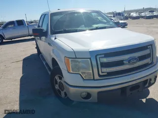 2013 Ford F-150 XL with VIN 1FTFW1CF7DFA66868, listed as a IAAI auction lot 41784163 with 218,303 mi miles. Bid and sale history available at carsss.com. Image 1.