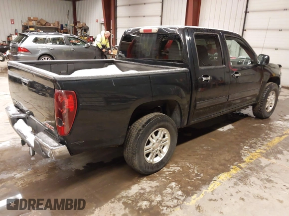 2009 GMC Canyon SLE1 with VIN 1GTDT13E698103718, listed as a IAAI auction lot 41581701 with 129,766 mi miles. Bid and sale history available at carsss.com. Image 4.