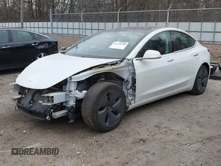 2020 Tesla Model 3 Standard Range Plus with VIN 5YJ3E1EA1LF799766, listed as a IAAI auction lot 41386508 with 90,000 mi miles. Bid and sale history available at carsss.com. Image 22.