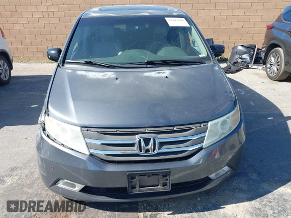 2011 Honda Odyssey Touring with VIN 5FNRL5H96BB009580, listed as a IAAI auction lot 42202595 with Not provided miles and . Bid and sale history available at DreamBid. Image 12.