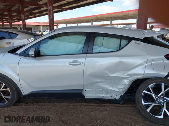 2022 Toyota C-HR XLE with VIN NMTKHMBX5NR147226, listed as a IAAI auction lot 42068867 with 21,863 mi miles. Bid and sale history available at carsss.com. Image 15.
