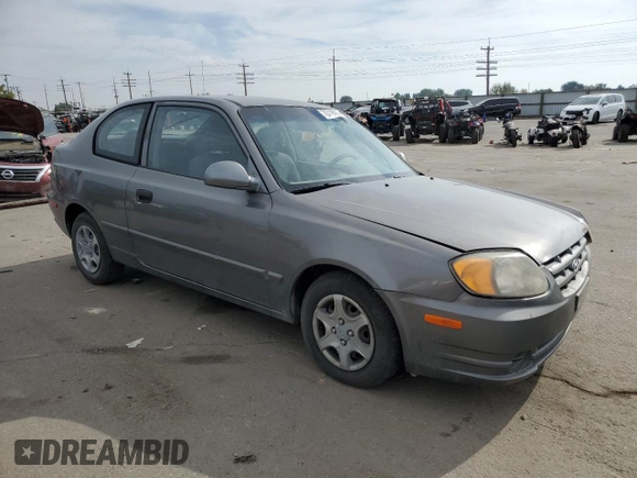2004 Hyundai Accent GL with VIN KMHCG35C34U290855, listed as a Copart auction lot 70719664 with 176,210 mi miles and Salvage Title. Bid and sale history available at carsss.com. Image 4.