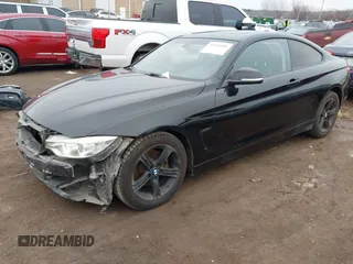 2014 BMW 4 Series 428i with VIN WBA3N7C50EF718339, listed as a IAAI auction lot 41403096 with 143,478 mi miles and . Bid and sale history available at carsss.com. Image 18.