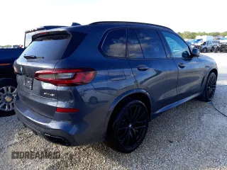 2022 BMW X5 sDrive40i with VIN 5UXCR4C08N9M98312, listed as a Copart auction lot 69814452 with 2,495 mi miles. Bid and sale history available at carsss.com. Image 3.