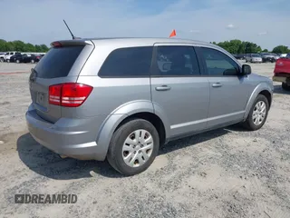 2015 Dodge Journey SE z VIN 3C4PDCAB0FT698674, wystawiony jako IAAI lot #42308994 z przebiegiem 97 640 mil mil oraz . Historia ofert i sprzedaży dostępna na DreamBid. Obrazek 4.