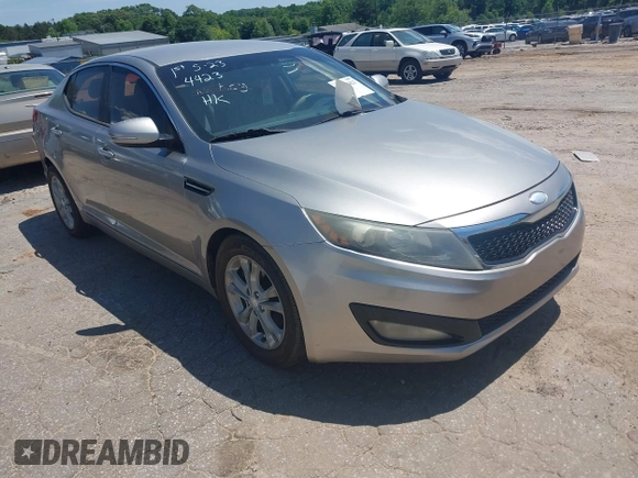2013 Kia Optima LX z VIN 5XXGM4A74DG216153, wystawiony jako IAAI lot #42304423 z przebiegiem 200 884 mil mil oraz . Historia ofert i sprzedaży dostępna na DreamBid. Obrazek 1.