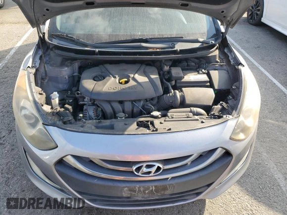 2013 Hyundai Elantra GT with VIN KMHD35LE2DU098164, listed as a Copart auction lot 77272174 with 165,061 mi miles and Salvage Title. Bid and sale history available at carsss.com. Image 11.