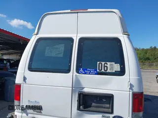 2012 Ford Econoline Cargo Commercial with VIN 1FTNS2EW4CDA50633, listed as a IAAI auction lot 40694015 with 309,334 mi miles. Bid and sale history available at carsss.com. Image 16.