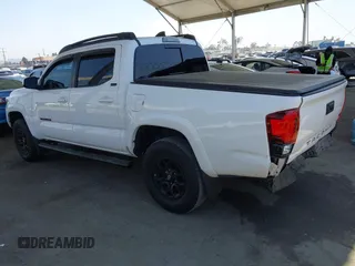 2020 Toyota Tacoma SR5 with VIN 3TMAZ5CN8LM118099, listed as a IAAI auction lot 42462393 with 44,795 mi miles and . Bid and sale history available at DreamBid. Image 3.