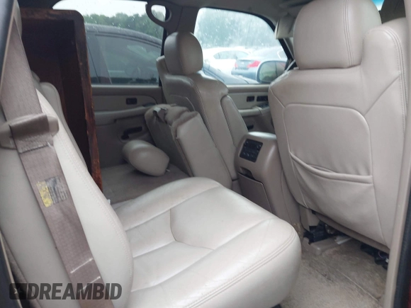 2003 Chevrolet Tahoe LS z VIN 1GNEC13Z73J164865, wystawiony jako IAAI lot #42213688 z przebiegiem Nie podano mil oraz . Historia ofert i sprzedaży dostępna na DreamBid. Obrazek 8.