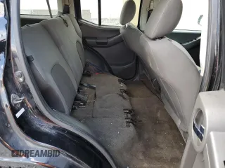 2010 Nissan Xterra S with VIN 5N1AN0NW8AC506660, listed as a Copart auction lot 55810805 with 203,227 mi miles and Salvage title. Bid and sale history available at DreamBid. Image 11.