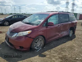 2016 Toyota Sienna XLE with VIN 5TDYK3DC5GS730870, listed as a Copart auction lot 62107505 with 131,619 mi miles and Salvage title. Bid and sale history available at DreamBid. Image 1.