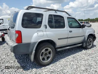 2004 Nissan Xterra XE z VIN 5N1ED28T04C659829, wystawiony jako Copart lot #57633085 z przebiegiem 180 057 mil mil oraz Szkody całkowita. Historia ofert i sprzedaży dostępna na DreamBid. Obrazek 3.