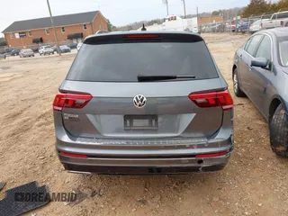 2020 Volkswagen Tiguan SE with VIN 3VV3B7AX7LM163193, listed as a IAAI auction lot 41751571 with 32,352 mi miles and . Bid and sale history available at DreamBid. Image 17.