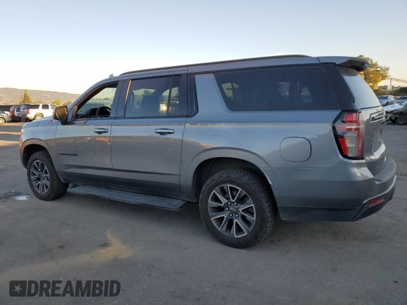 2021 Chevrolet Suburban Z71 with VIN 1GNSKDKDXMR310076, listed as a Copart auction lot 43055185 with 88,300 mi miles and Salvage title. Bid and sale history available at DreamBid. Image 2.
