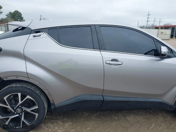2019 Toyota C-HR XLE with VIN NMTKHMBX0KR082023, listed as a IAAI auction lot 41606867 with 52,814 mi miles. Bid and sale history available at carsss.com. Image 14.