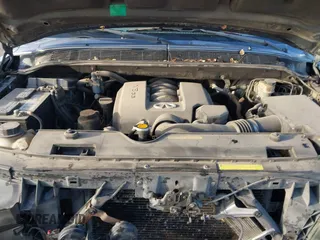 2004 Infiniti QX56 with VIN 5N3AA08C34N803588, listed as a IAAI auction lot 41546043 with 190,599 mi miles. Bid and sale history available at carsss.com. Image 10.