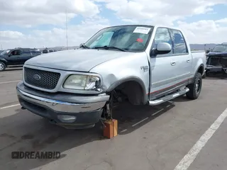 2003 Ford F-150 XLT with VIN 1FTRW08LX3KC79700, listed as a IAAI auction lot 41680562 with 131,052 mi miles. Bid and sale history available at carsss.com. Image 18.