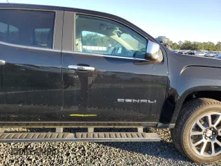 2021 GMC Canyon 2WD Denali with VIN 1GTG5EEN2M1107052, listed as a Copart auction lot 76377704 with 11,696 mi miles and Salvage Title. Bid and sale history available at carsss.com. Image 12.