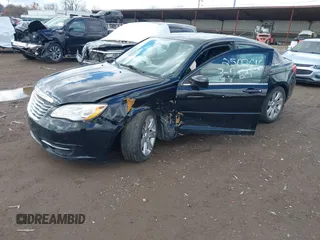2013 Chrysler 200 Touring with VIN 1C3CCBBB7DN656174, listed as a IAAI auction lot 41817135 with 142,156 mi miles and . Bid and sale history available at carsss.com. Image 2.