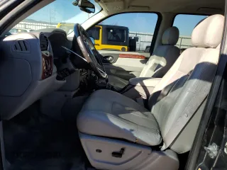 2007 GMC Envoy SLE with VIN 1GKDT13S572183409, listed as a Copart auction lot 76072734 with 165,362 mi miles and Salvage Title. Bid and sale history available at carsss.com. Image 7.