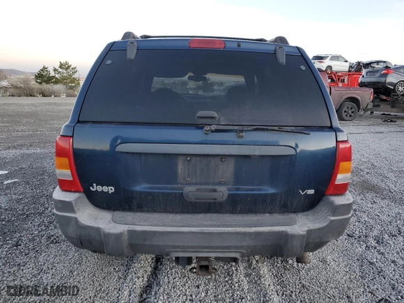 1999 Jeep Grand Cherokee Laredo with VIN 1J4GW58N6XC784679, listed as a Copart auction lot 85345304 with 234,584 mi miles and Salvage Title. Bid and sale history available at carsss.com. Image 6.