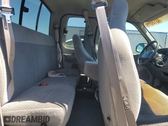 1999 Ford F-150 XL с VIN 1FTRX17L1XKC25356, выставлен на аукционе Copart как лот 65149275 с пробегом 205 482 миль миль и Чистый • Clean title. История ставок и продаж доступна на DreamBid. Изображение 10.