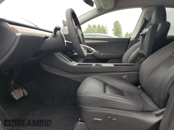 2023 Tesla Model Y Long Range z VIN 7SAYGDEE3PF751019, wystawiony jako Copart lot #57972885 z przebiegiem 24 591 mil mil oraz Szkoda całkowita • Salvage title. Historia ofert i sprzedaży dostępna na DreamBid. Obrazek 7.