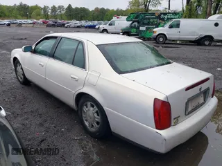 2004 Cadillac DeVille z VIN 1G6KD54Y04U208052, wystawiony jako IAAI lot #42190581 z przebiegiem 163 294 mil mil oraz . Historia ofert i sprzedaży dostępna na DreamBid. Obrazek 3.