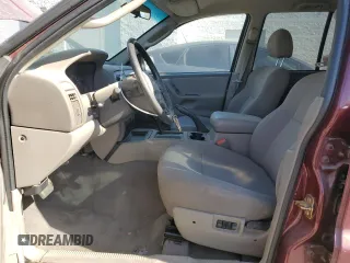 2002 Jeep Grand Cherokee Laredo with VIN 1J4GX48S52C265385, listed as a Copart auction lot 88823385 with 225,106 mi miles and Clean title. Bid and sale history available at DreamBid. Image 7.