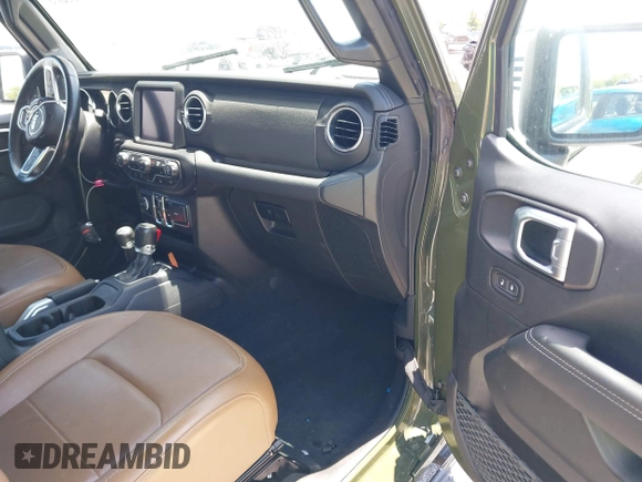 2022 Jeep Wrangler Unlimited Sahara z VIN 1C4HJXEN3NW242458, wystawiony jako IAAI lot #42352073 z przebiegiem 26 154 mil mil oraz . Historia ofert i sprzedaży dostępna na DreamBid. Obrazek 5.