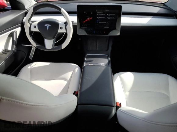 2021 Tesla Model 3 Standard Range Plus with VIN 5YJ3E1EA9MF870214, listed as a Copart auction lot 47702535 with 46,486 mi miles and Salvage Title. Bid and sale history available at DreamBid. Image 8.