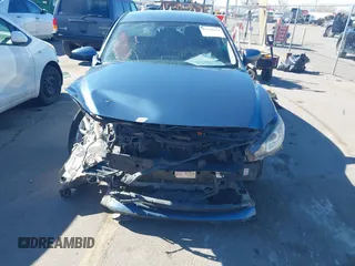 2016 Mazda 6 i Sport with VIN JM1GJ1U57G1451597, listed as a IAAI auction lot 41658184 with 142,504 mi miles and . Bid and sale history available at DreamBid. Image 12.