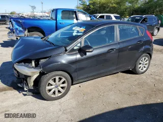 2013 Ford Fiesta SE with VIN 3FADP4EJXDM202150, listed as a Copart auction lot 79851174 with 127,979 mi miles and Salvage Title. Bid and sale history available at carsss.com. Image 1.