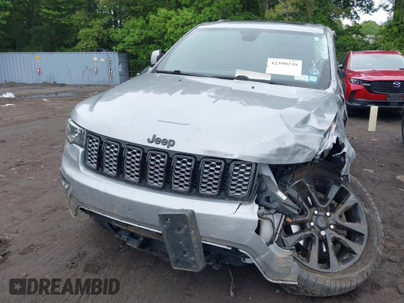 2019 Jeep Grand Cherokee Laredo E with VIN 1C4RJFAG5KC567003, listed as a IAAI auction lot 42390239 with 82,505 mi miles and . Bid and sale history available at DreamBid. Image 12.