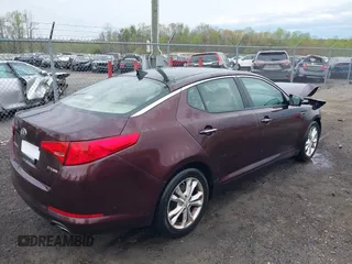 2013 Kia Optima EX with VIN 5XXGN4A73DG147517, listed as a IAAI auction lot 41959679 with 133,810 mi miles and . Bid and sale history available at DreamBid. Image 4.