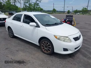 2009 Toyota Corolla with VIN 1NXBU40E09Z126070, listed as a IAAI auction lot 42196014 with 165,131 mi miles and . Bid and sale history available at DreamBid. Image 1.