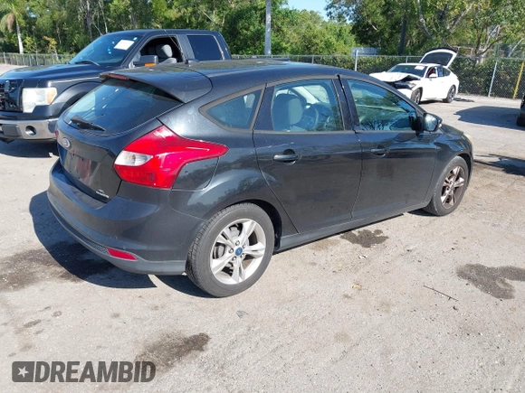2014 Ford Focus SE with VIN 1FADP3K25EL161324, listed as a IAAI auction lot 42041515 with 80,617 mi miles. Bid and sale history available at carsss.com. Image 4.