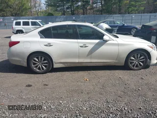 2014 Infiniti Q50 Premium with VIN JN1BV7AR5EM703788, listed as a IAAI auction lot 42118192 with 153,859 mi miles and . Bid and sale history available at DreamBid. Image 13.