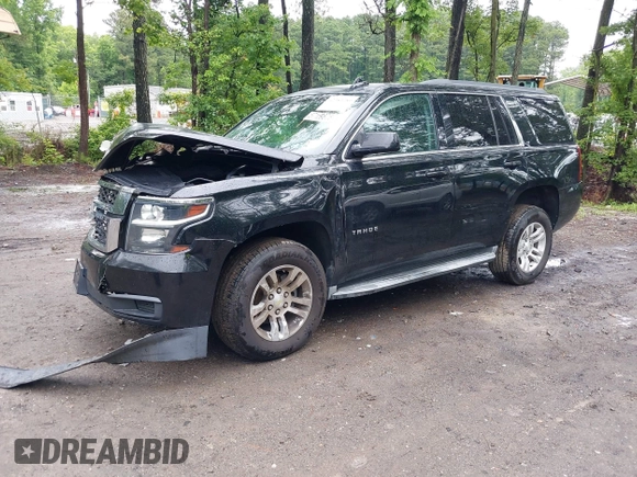 2015 Chevrolet Tahoe LT with VIN 1GNSCBKC9FR600997, listed as a IAAI auction lot 42383789 with 161,151 mi miles and . Bid and sale history available at DreamBid. Image 2.