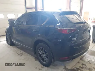 2020 Mazda CX-5 Touring with VIN JM3KFBCM6L0739077, listed as a IAAI auction lot 41810946 with 82,911 mi miles and . Bid and sale history available at carsss.com. Image 3.