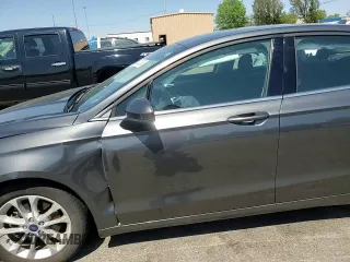2020 Ford Fusion SE z VIN 3FA6P0HD3LR252722, wystawiony jako Copart lot #54243945 z przebiegiem 29 076 mil mil oraz Szkoda całkowita • Salvage title. Historia ofert i sprzedaży dostępna na DreamBid. Obrazek 13.