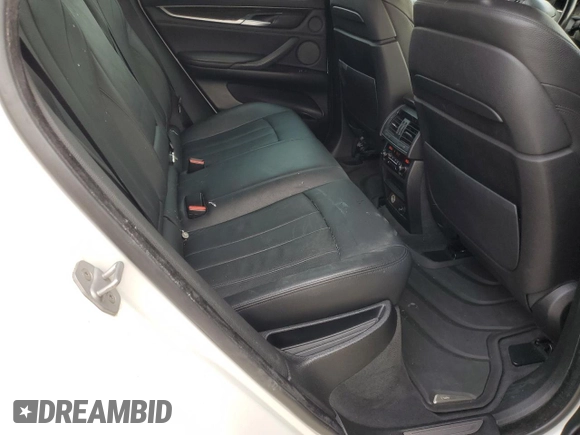 2015 BMW X6 xDrive50i with VIN 5UXKU6C55F0F94151, listed as a Copart auction lot 46826775 with 129,925 mi miles and Salvage Title. Bid and sale history available at carsss.com. Image 11.