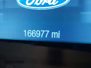 2013 Ford Taurus SEL with VIN 1FAHP2E83DG224780, listed as a IAAI auction lot 41675601 with 166,977 mi miles. Bid and sale history available at carsss.com. Image 15.