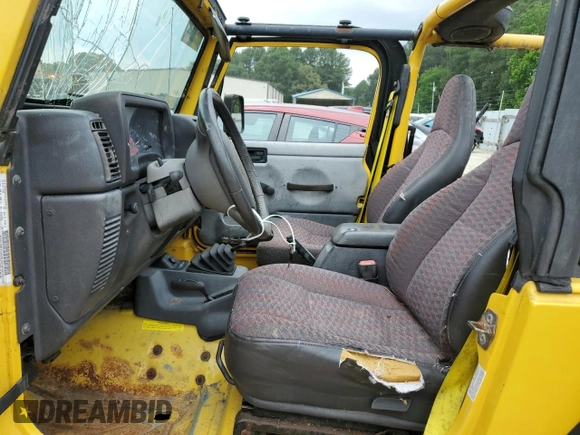 2000 Jeep Wrangler Sport with VIN 1J4FA49SXYP789791, listed as a Copart auction lot 60538875 with Not provided miles and Salvage title. Bid and sale history available at DreamBid. Image 7.