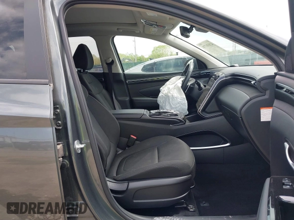 2022 Hyundai Tucson SEL Convenience with VIN KM8JFCA14NU076957, listed as a IAAI auction lot 42038770 with 20,057 mi miles and . Bid and sale history available at carsss.com. Image 5.