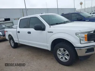 2018 Ford F-150 XL with VIN 1FTFW1E58JKE22834, listed as a IAAI auction lot 41923960 with 214,459 mi miles. Bid and sale history available at carsss.com. Image 14.